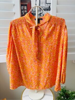 A love story. Size 2X. Floral Tie-Neck Blouse in Orange